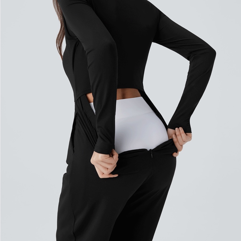 Halara Black SculptKnit V Neck Sleeveless Ruched
Pocket Jumpsuit, Easy Peezy - Picture 7 of 10